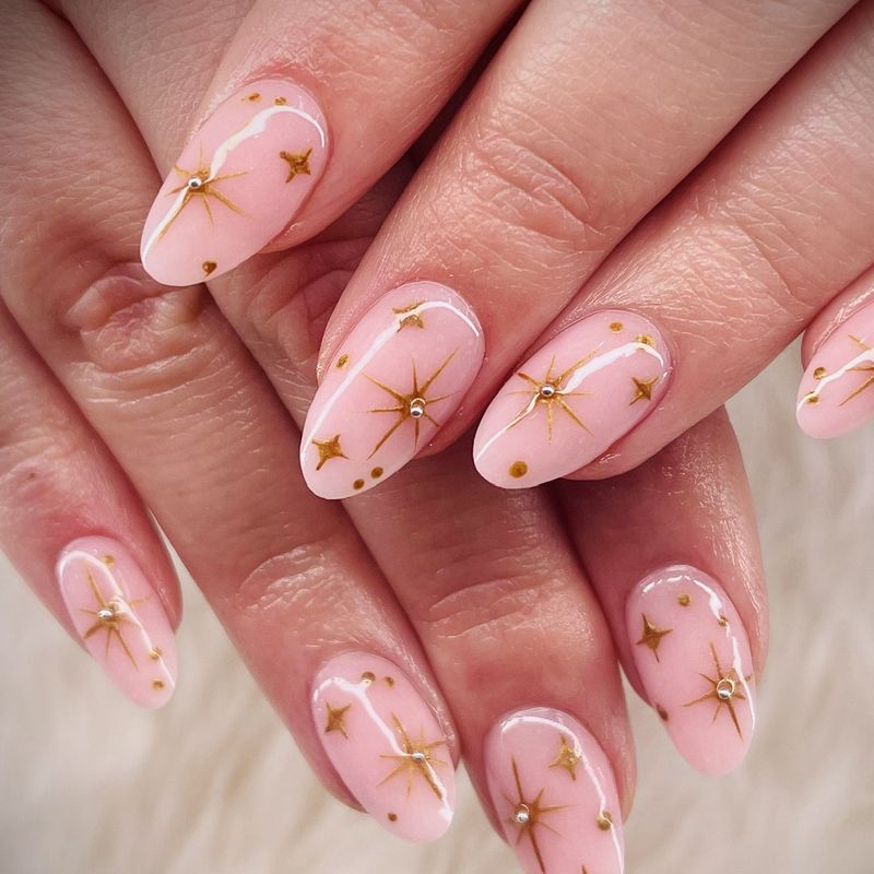 Hand-painted gold stars on a pink base